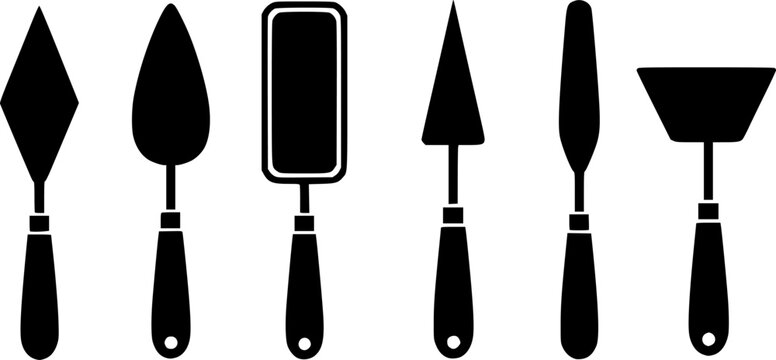 Set of six black and white palette knives with different blade shapes
