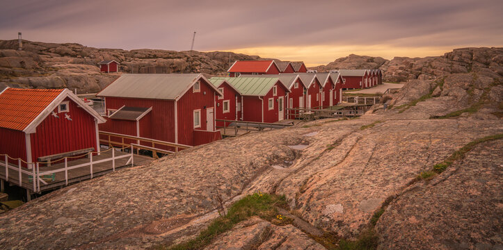 Traditional red wooden fishing cabins in Sm&ouml;gen Sweden