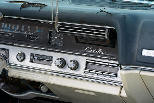 FINOWFURT, GERMANY - JUNE 28, 2025: Worn dashboard detail of a luxury car, Cadillac DeVille 1967. Roadrunner's Paradise Race 61 Festival.