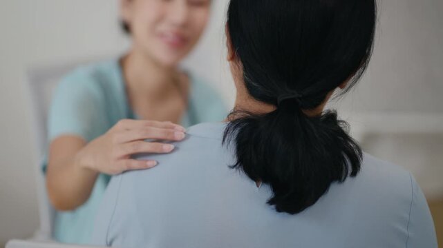 Doctor or Mental health and elderly care concept.Close up hands of doctor or caregiver hands elderly home care or hospital.Arthritis person's hand in support of geriatric nursing caregiver in hospital