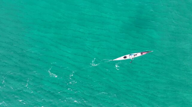 Incredible Aerial View of Kayaker Paddling Over Sharks in Crystal Clear Turquoise Water - Hadera, Israel