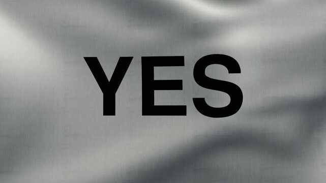 The word YES displayed on the fabric of the waving flag