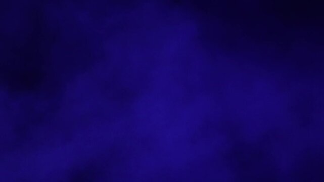 Blue smoke and dust on a black background. Fast-moving fog and smog 4K video