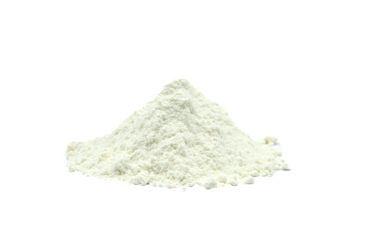 pile of white wheat flour isolated on white background for baking design
