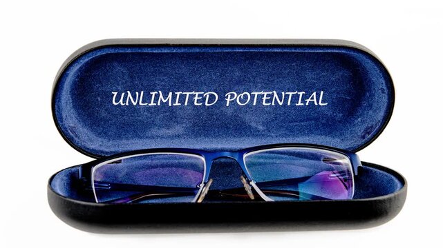 Deep blue case reveals Unlimited Potential over blue-rimmed glasses, on white