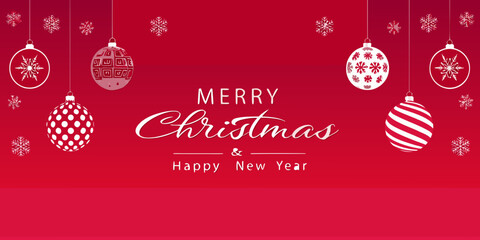 Festive christmas ornaments and greetings on a vibrant red background © Dayal