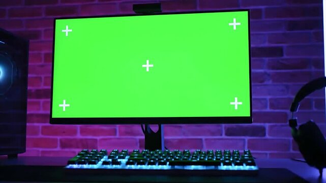 A streamer's gaming room setup with a green screen background, perfect for content creation and broadcasting