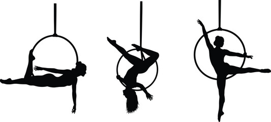 Set of three black silhouettes showing aerial dance performers posing on hanging lyra hoops isolated on white background for artistic design, © Kaziul