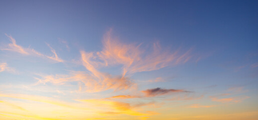 Breathtaking Vibrant Sunset Sky with Purple and Orange Pastel Clouds,A stunning twilight sky...