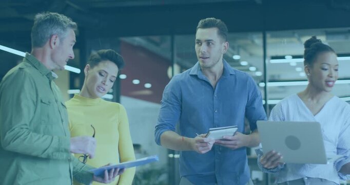 Team shifting focus as senior entering, exchanging tablet while code overlays animating planning