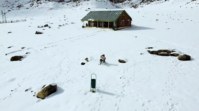 Remote Snowy Mountain Pass With Isolated Building