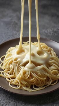 Spaghetti pasta formed into screaming face on plate. Surreal food art with melted cheese and fork lifting noodles. Close-up lockdown shot.