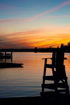 Lifeguard Chair Silhouette at Sunset Over Meydenbauer Bay Bellevue Washington