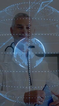 Vertical video: Doctor entering frame holding blue device bringing scope into medical AR globe