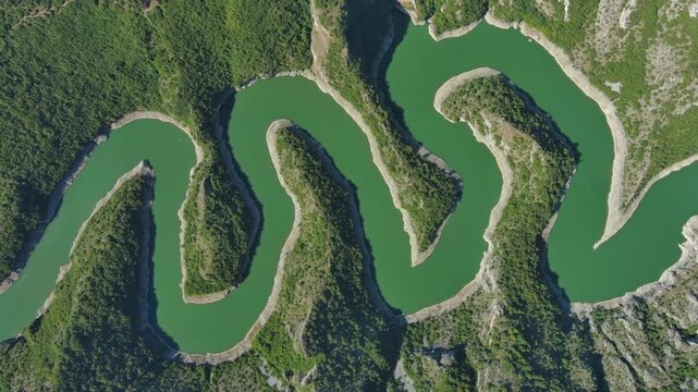 Aerial top view of curved meanders in canyon of Uvac river, Serbia, 4k
