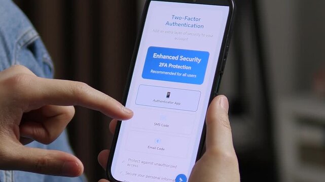 Setting Up Two-Factor Authentication on Smartphone for Security. Close-up of a person activating two-factor authentication (2FA) on a mobile phone. Clean UI showing Authenticator, SMS, and Email