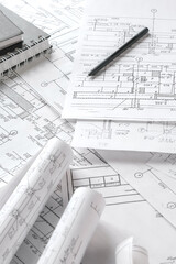 Architects concept, engineer architect designer freelance work on start-up project drawing, construction plan architect design working drawing sketch plans blueprints and making construction model