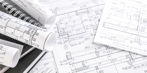 Architects concept, engineer architect designer freelance work on start-up project drawing, construction plan architect design working drawing sketch plans blueprints and making construction model