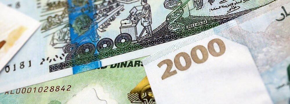 Algerian dinar paper banknotes pile on table. Algeria DZD currency money bills in big amount. Concept of economics, taxation and banking in Algeria