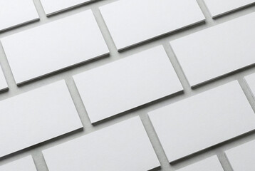 Obraz premium Minimalist Business Card Mockup Grid with Blank White Cards for Branding Design