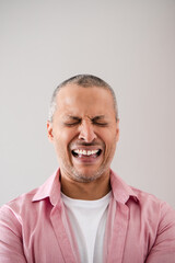 Emotional Mature Man Crying or Expressing Grief