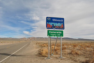 Nevada state line sign at Esmeralda County in the Great Basin Desert