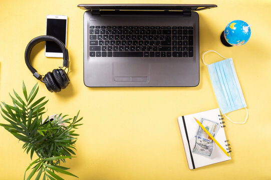 A notebook and a notepad for writing. Planning and forecasting. Searching for information on the Internet. A notebook, a pencil and money.