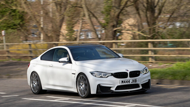 Milton Keynes,Bucks,UK - Mar 5th 2026: 2020 white BMW M4 car driving on a British road