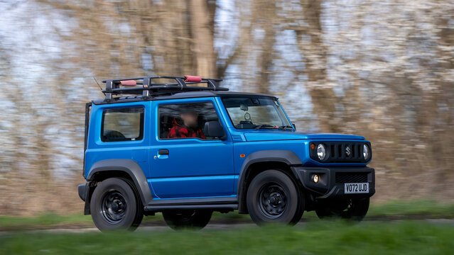 Milton Keynes,Bucks,UK - Mar 1st 2026:  2022 blue Suzuki Jimny  car driving on a British road