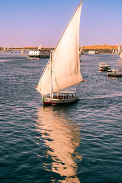 Boats on the Nile at sunset, Aswan Egypt 