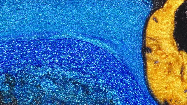 Blue And Gold Glitter Abstract Texture Close-Up Macro Shimmering Metallic Paint Background For Design