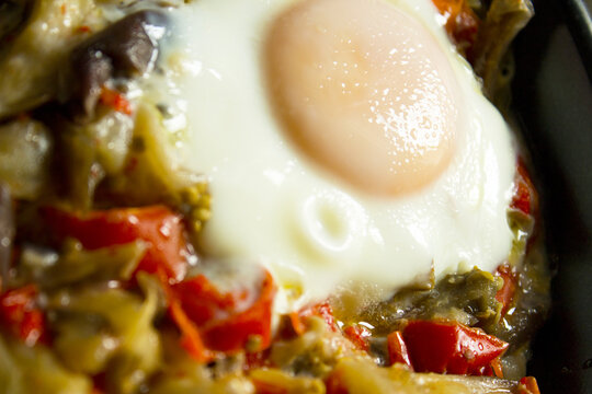 Cooked vegetables with poached egg