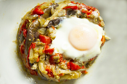 Cooked vegetables with poached egg