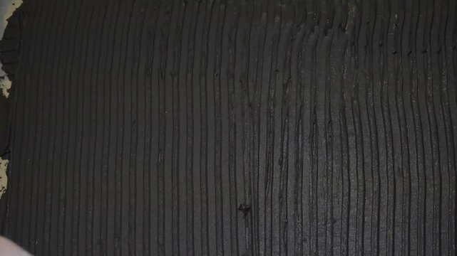 Meticulous Technique Crafts Uniform Mortar Lines For Optimal Tile Adherence And Appearance