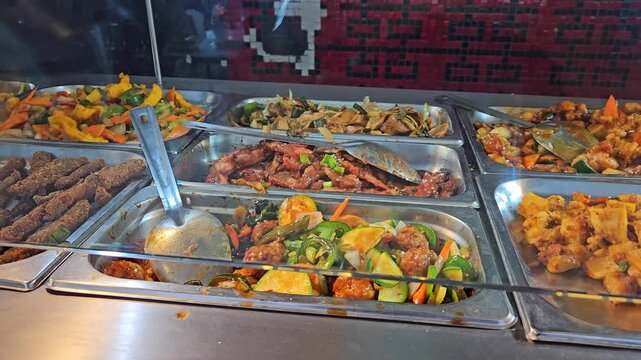 Assorted Asian cuisine dishes ready for takeaway service