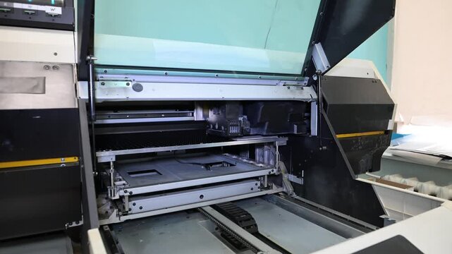 Souvenir printer in progress. The electromechanical pen and souvenir printing machine works by moving the print head
