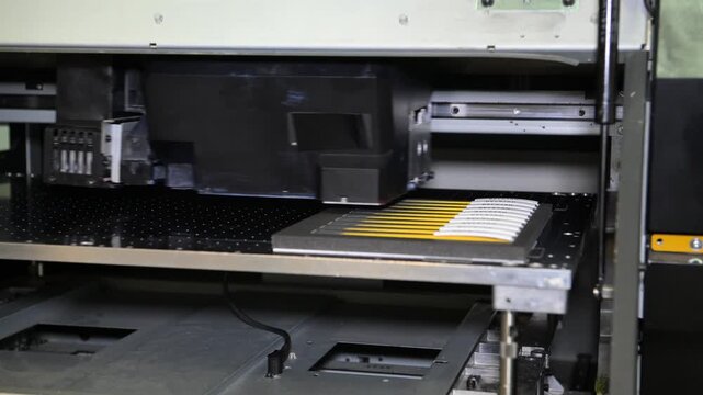 Souvenir printer in progress. The electromechanical pen and souvenir printing machine works by moving the print head