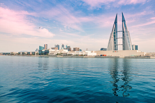 2 December 2025, Bahrain, Manama: World Trade Center towers overlooking city across water bay near The Avenues Mall