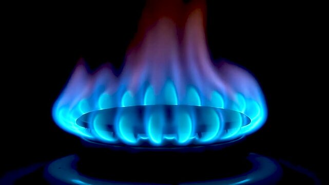 Close up of blue gas flame burning on a kitchen stove burner. generated with AI