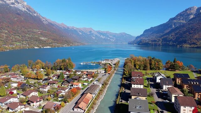 Lutschine river flowing into Lake Brienz autumn aerial landscape. Interlaken, Canton of Bern, Switzerland.