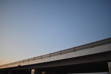 Fototapeta premium Concrete Elevated Road Against Clear Dusk Sky