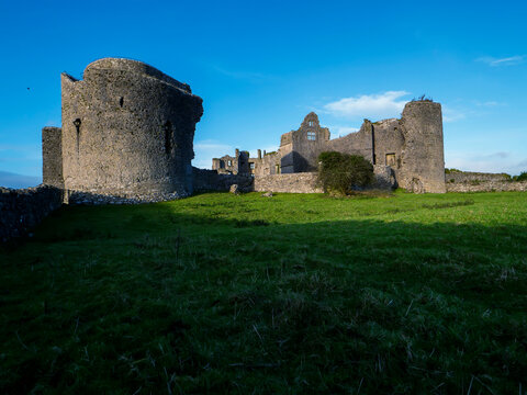 Stunning old fortress castle in Roscommon town, Ireland. Famous tourist attraction with nice green park and amazing view. Powerful stone wall and towers to protect important people. Irish history.