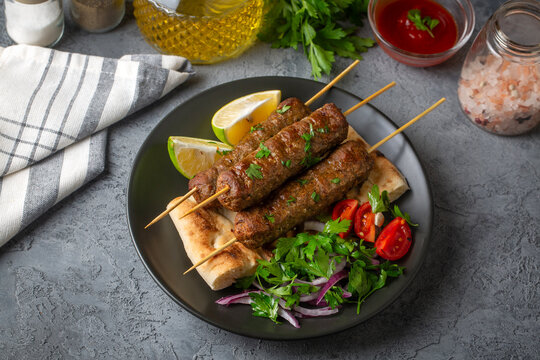 Grilled lula kebab on skewers meatballs