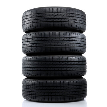 Set of Tires. Four car tires stacked on white studio background.