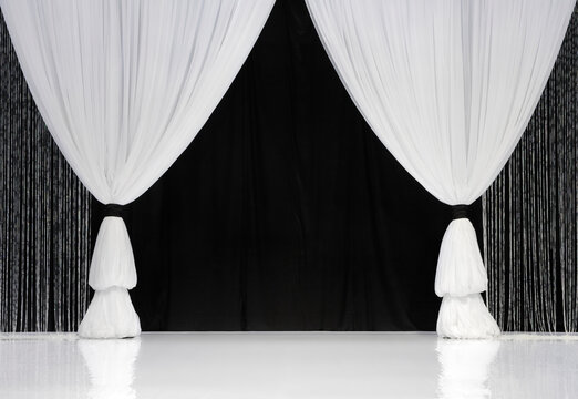 White Stage Curtains with black drapes