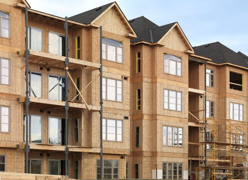 Construction Site Wooden frame residential condo houses being built