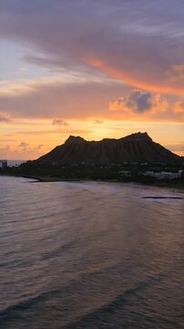 Golden sunrise over diamond head and waikiki beach