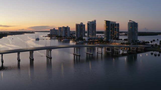 Aerial view of florida cityscape and bridge at sunrise
