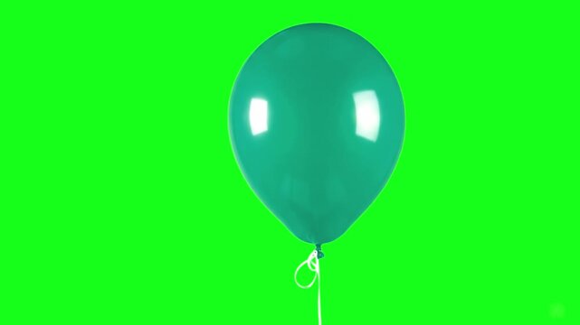 A photorealistic 3D animation of a single, inflated, highly-reflective green latex balloon, with a white knot and string attached, floating gently. Ideal for Saint Patrick's Day, nature-themed events,