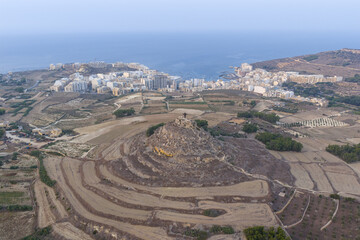 Terraced hills and coastal village panorama - Zebbug, Malta